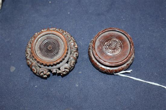 A pair of 18th century Chinese blanc de chine libation cups, wood stands